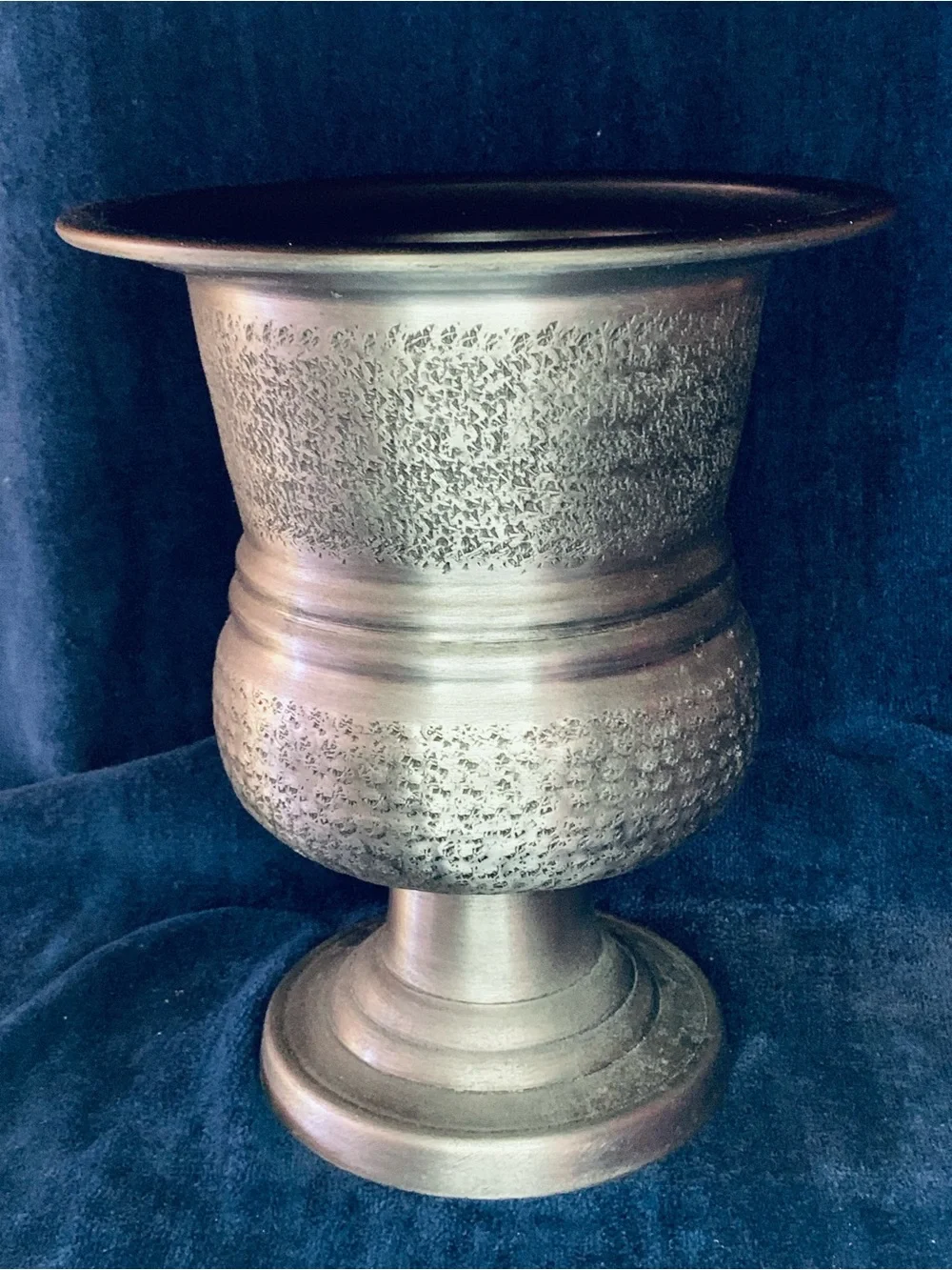 Decorative Urn Vase With a hammered interior design.